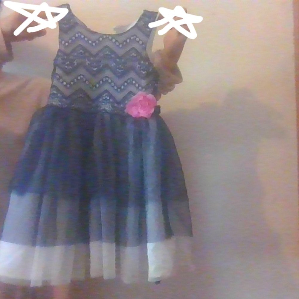 A kids blue and white on occasion dress.